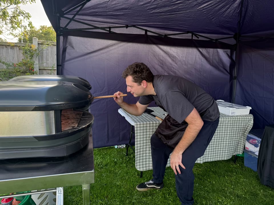 Xanders catering team preparing fresh pizza